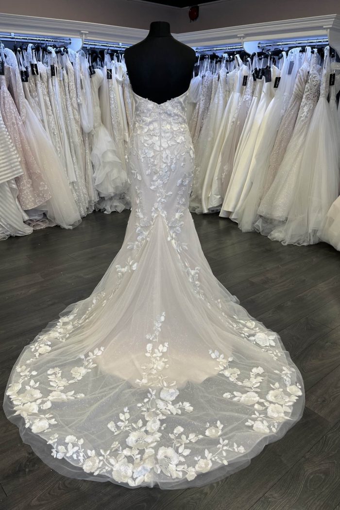 wedding dress with small train, wedding dress with embroidered lace, wedding dress with flowers, blush wedding dress